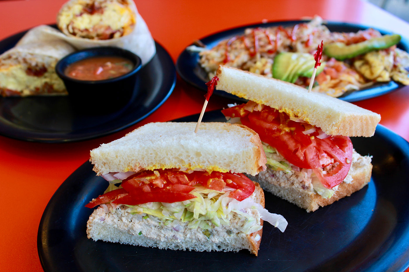 Rooster Cafe tuna sandwich served with chips